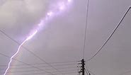 'One in a million' moment bolt of lightning strikes curvature of rainbow