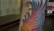 “Rising from the Ashes, this Tattoo tells a story of Resilience and Triumph. 🦅🔥 We’ve added a custom-designed phoenix to our footballer client’s full leg sleeve, symbolizing his inspiring journey of recovery. It’s a reminder to never give up, to always rise above adversity. The vibrant colors and flowing Neo traditional style perfectly complement the musculature of the calves. Keep pushing forward! 💪✨ . Awesome work by @vshiva.art with @aj.frames Powered by @tattootribe.community . #TattooJou