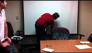 How to roll up a projector screen