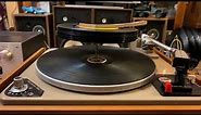 Garrard AT6 auto changer playing 10x 45 rpm vinyl records.