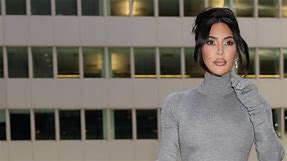 Kim Kardashian Wearing a Turtleneck Sweater Dress in August Proves That Fall Is Really Just a State of Mind