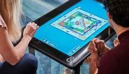 Touchscreen table packs dozens of digital board games and puzzles