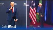 Joe Biden awkwardly stumbles into pole and doesn't shake President Lula's hand