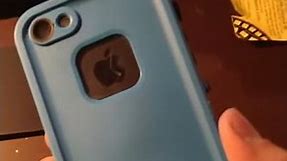 Wireless charging iPhone 5 in lifeproof case.