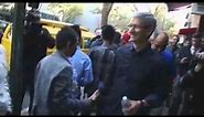 Raw: Apple CEO Tim Cook Surprises iPhone Crowd