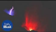 Lightning bolt flashes over La Palma as lava rivers flow down volcano