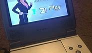 Dynex 7” Portable DVD PLayer - Silver and Black