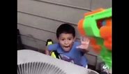 Kid gets shot by nerf gun meme.