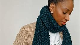 Stay warm and stylish in a timeless classic. Hand knitted 100% merino wool tassel scarf in forest green with sandstone tassels. #knitsandbobsklr #knititslow #stylishknitting #fashionknitwear #handmadeknitwear #winteraccessories #cosystyle | KnitsandBobs Klr