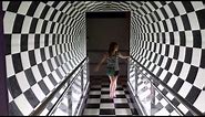 Walking through an optical illusion tunnel