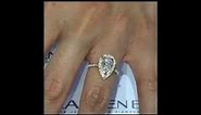 1 Carat Pear Diamond Engagement Ring In Yellow Gold Halo