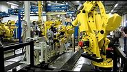 Material Handling - FANUC Robots for Transferring Axles to Conveyor Carriers