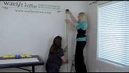 How To Apply a Vinyl Growth Chart Decal To Your Wall