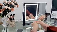 black trifold mirror with light