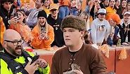 Tennessee Volunteers Football mascot Davey Crockett catches a squirrel during the game
