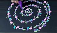 Drawing a Spiral Flower Vine Doodle on Black Paper with Paint Pens