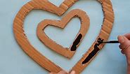 diy heart decoration with cardboard and earbuds