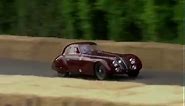 Long, low and sleek Alfa Romeo 8C 2900B 'Le Mans' glides up the Hill