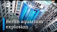 Giant aquarium burst in Berlin spills 1 million liters of water | DW News