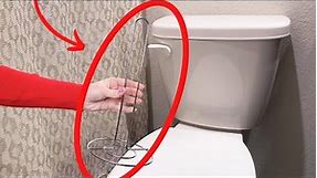 Stick a paper towel holder on your toilet (BRILLIANT!)