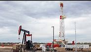 Oilfield Technology Center Raises Mast on Oil Rig