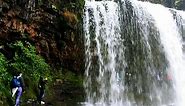 Wales Outdoors - Walking behind Sgwd yr Eira on a wet not...