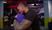John Cena and Randy Orton share a hug backstage Raw, November 22, 2010