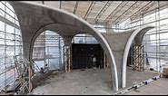 Doubly curved concrete roof complete