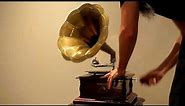 Playing the His Master's Voice hand crank gramophone.