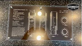 US Patent blueprint display. Laser engraving on anodized aluminum with an acrylic front panel.