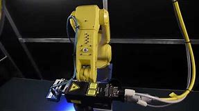 Robotic Fixtureless Laser Marking System - Triton Automation Group
