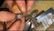 Making a sterling silver opal ring.