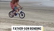 Dad Teaches Son How to Ride Bike on Beach