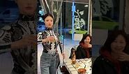 A Realistic Chinese Robot Waiter Enhances Dining Experience in a Chongqing Hotpot Restaurant