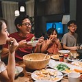 Chinese Family Having Dinner