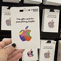 Hand Holding Apple Gift Card