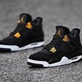 Jordan 4 Black and Gold