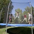 Kids Playing Jumping Trampoline