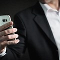 Man Holding Phone First Person