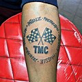 Nipsey Hussle TMC Race Flag Tattoo