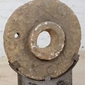 Stone Wheel Steel Sculpture