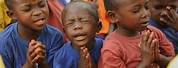 African Child Praying