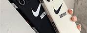 An iPhone 11 Black and White Nike Case