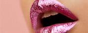 Applying Metallic Pink Lipstick