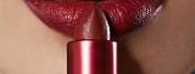 Applying Pretty Red Lipstick