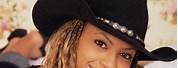 Beyoncé Black Dress Cowboy Hat Pics