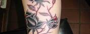Gothic Rose Vine Arm Tattoo
