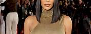 Kim Kardashian Gold Outfit