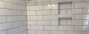 Tub with White Subway Tile and Gray Grout