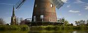 Windmill On Water during the Day